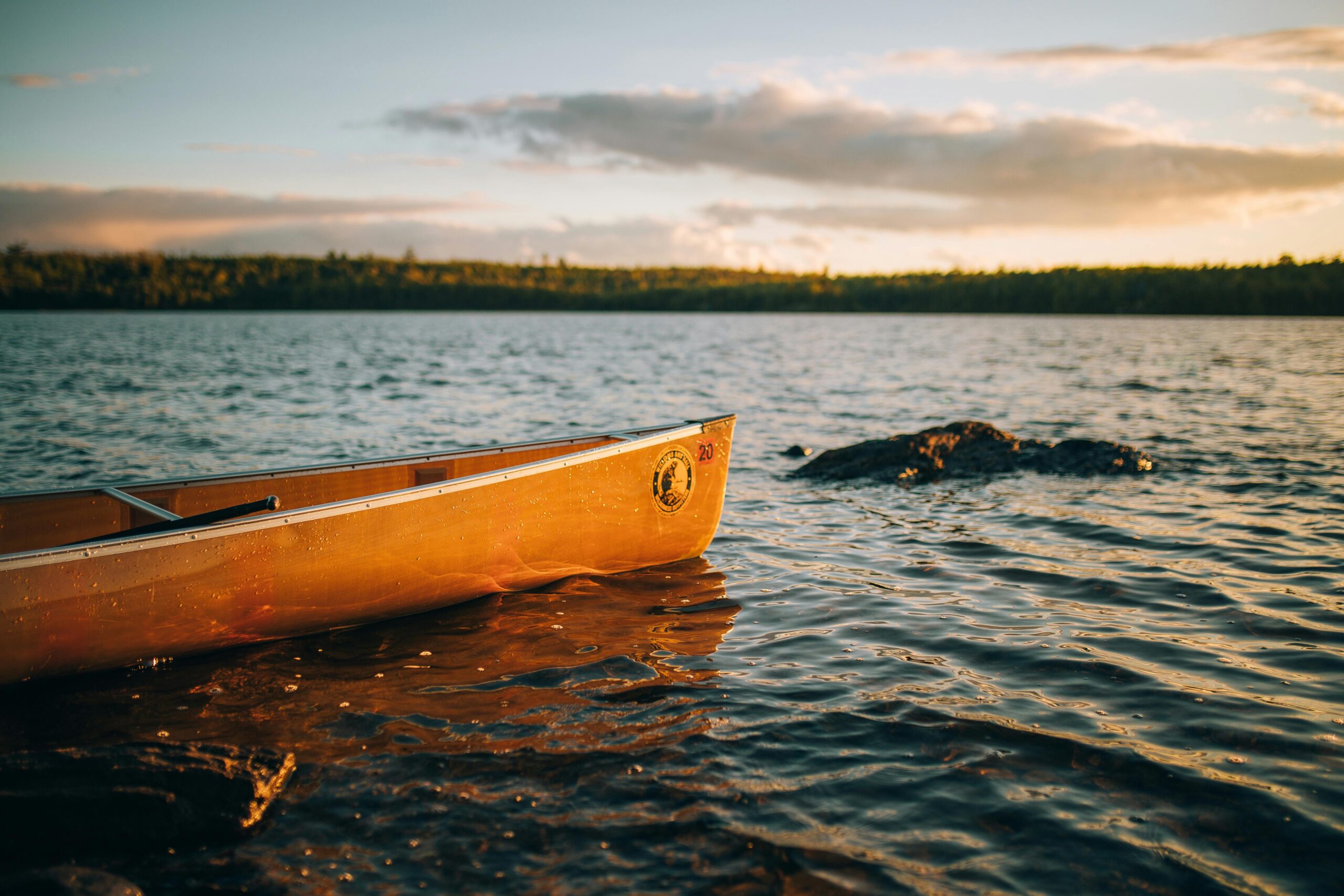 Yellow Canoe on Body of Water